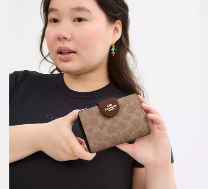 Monedero Coach