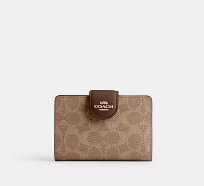 Monedero Coach