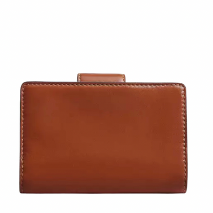 Monedero Coach